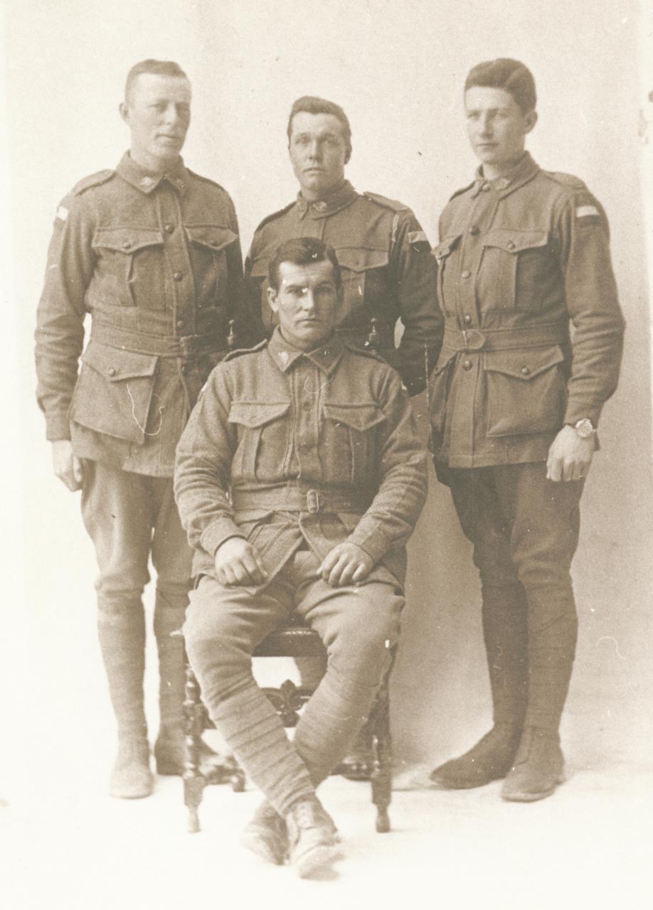 Pte John [Jack] Host, centre back, with other members of the 16th Bn, 1917.
