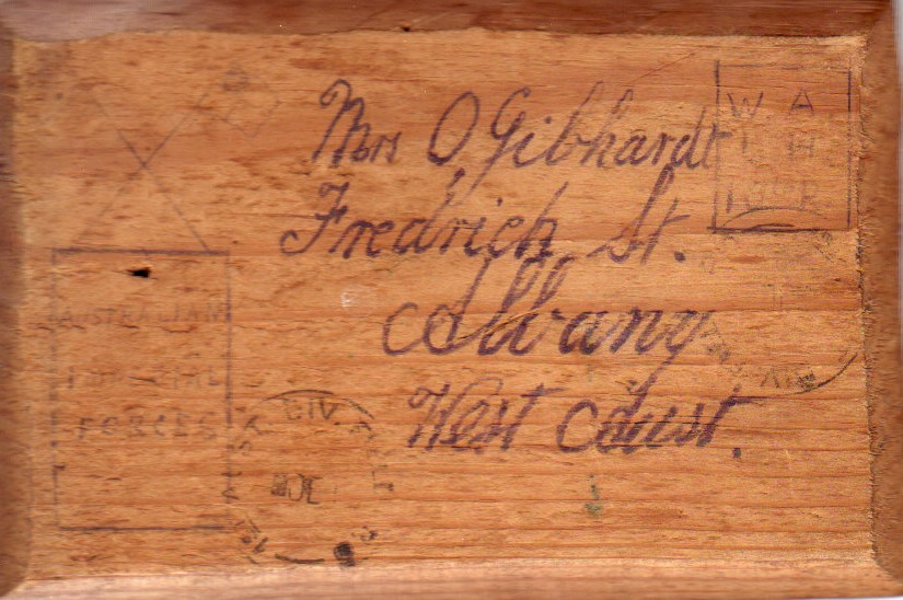 The cigar box lid finds its way back to Albany.