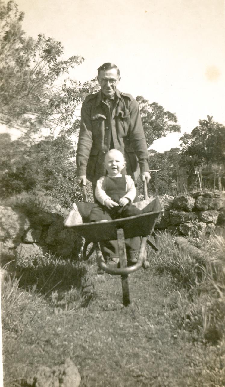 Eric enjoying the garden with grandson David in 1946.