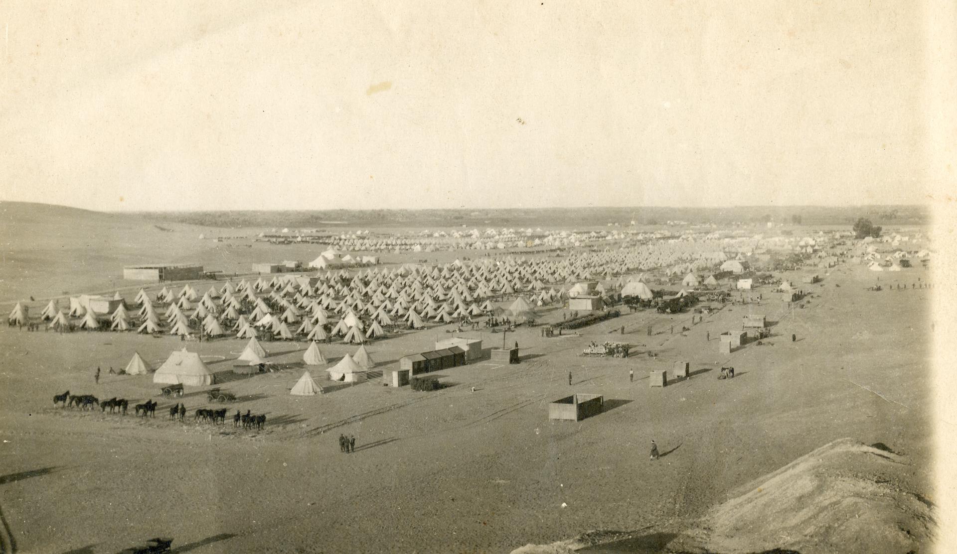 Mena training camp, Egypt.  The 8th Battalion is in the foreground, the artillery at the rear and brigade headquarters near the tree, far right.
