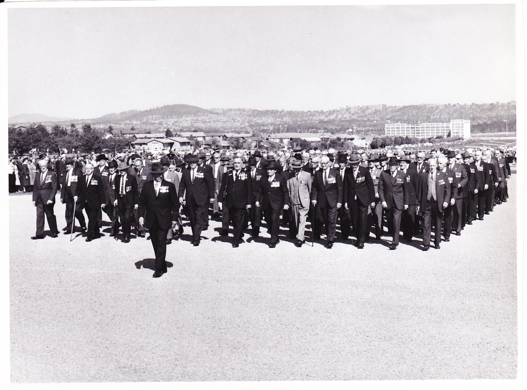 Returned servicemen are led by Clive Newman in the ANZAC march, Canberra [ca 1960]