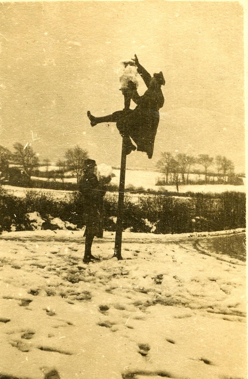 Celebrating the armistice, Pte Reg Polkinghorne stands at the ready with a ball of snow in Weymouth, 1918.