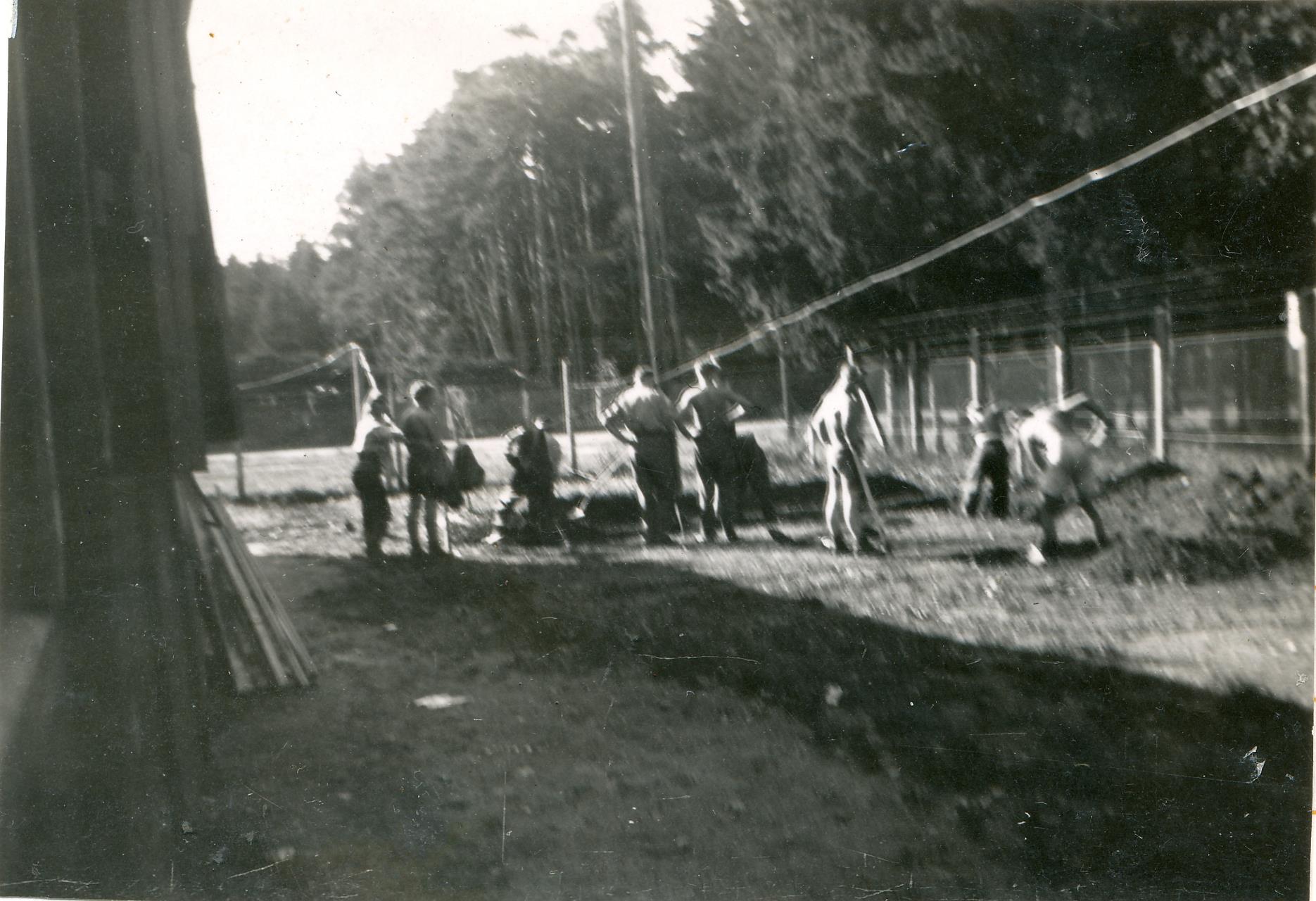 Prisoners of war were kept occupied digging slit trenches in the stalag.